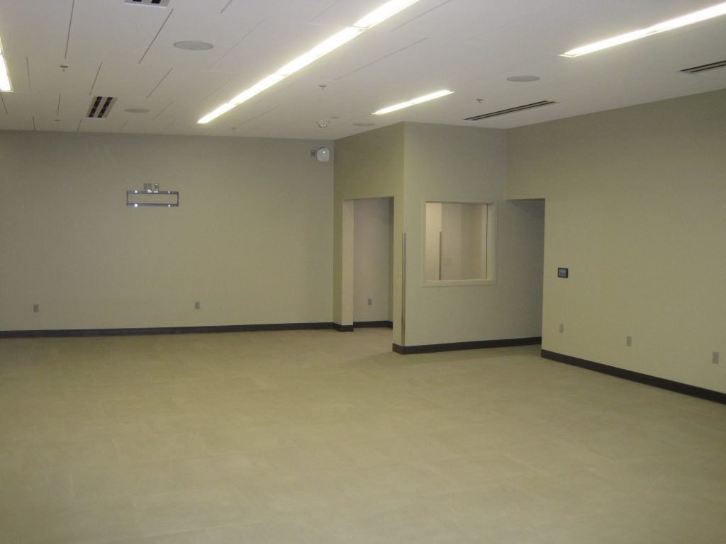 Massive home locker room. Most player lockers in this room
